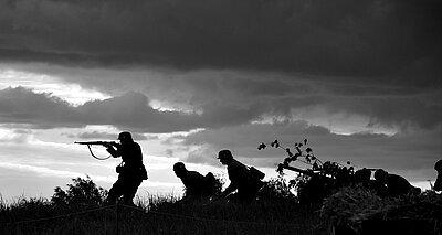 Werbebild: Vortrag Krieg 